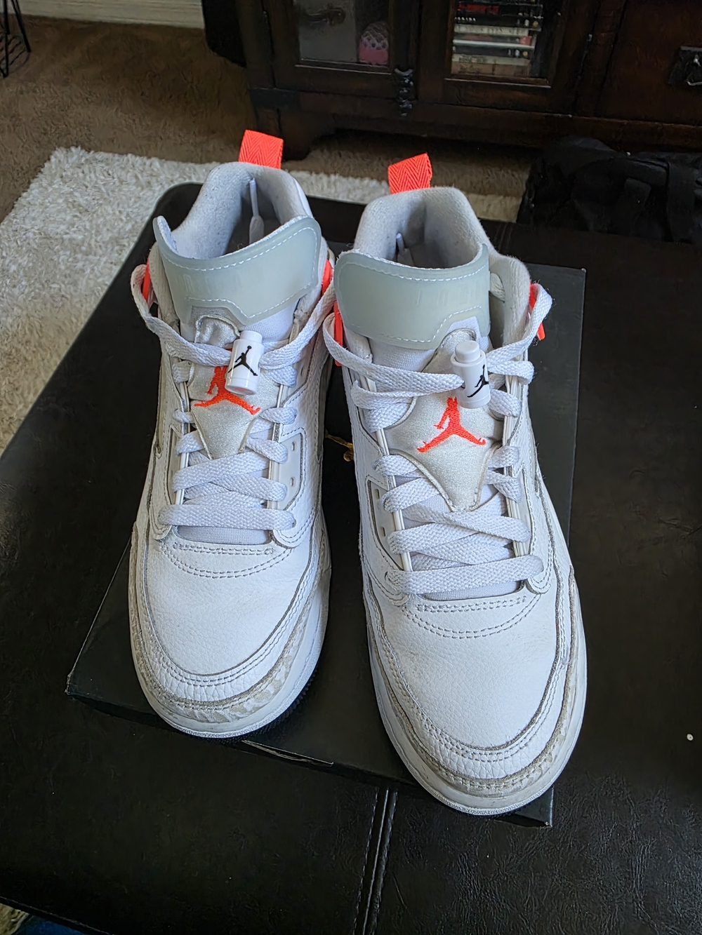 Jordan Kids White Sneakers with Bright Orange Accents